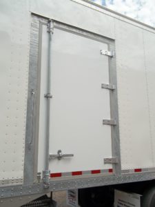 Custom semi trailer with curbside door