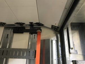 Custom semi trailer with overhead rear door