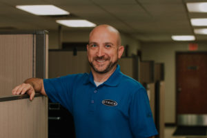 Strick employee in office environment