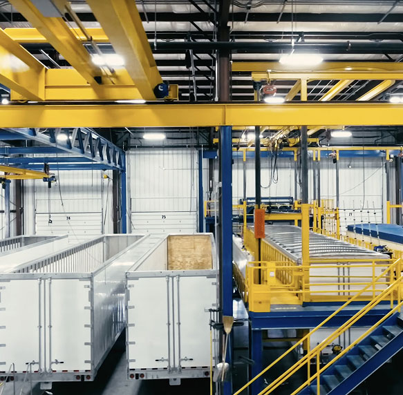 Inside the Strick warehouse, a leading US Semi-Trailer Manufacturer, with several semi trailers being built Inside the Strick warehouse, a leading US Semi-Trailer Manufacturer, with several semi trailers being built