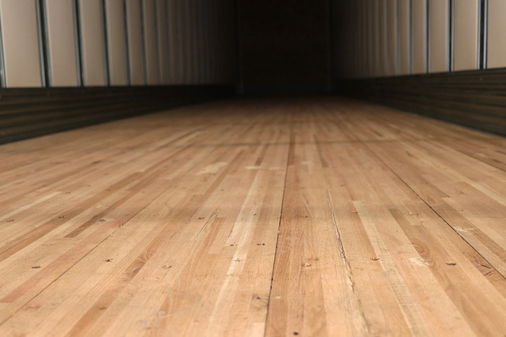 Strick Trailer standard flooring with aluminum scuff lining Strick Trailer standard flooring with aluminum scuff lining