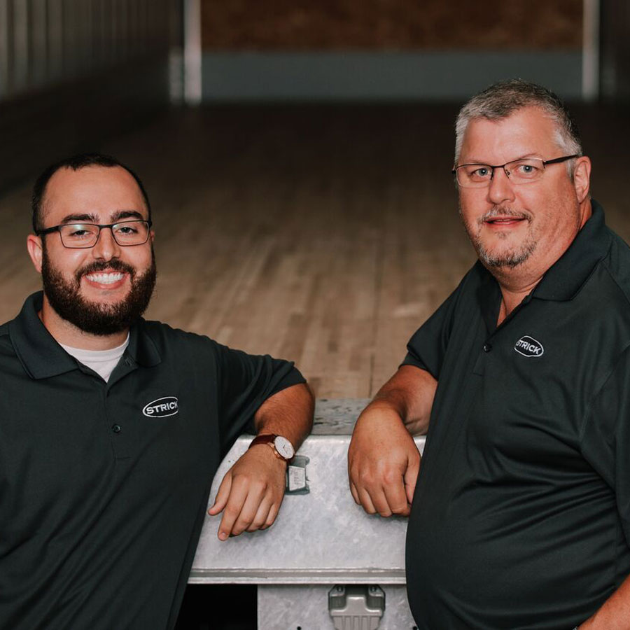 Strick Careers Sam and Craig Strick Careers Sam and Craig stand in front of a semi trailer